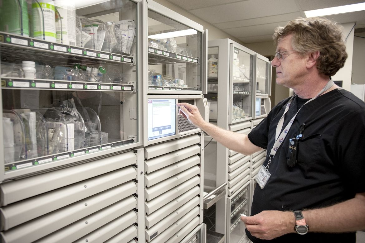Registered Nurse Randy Powell uses one of two new cabinets in action on Kidd 4.
