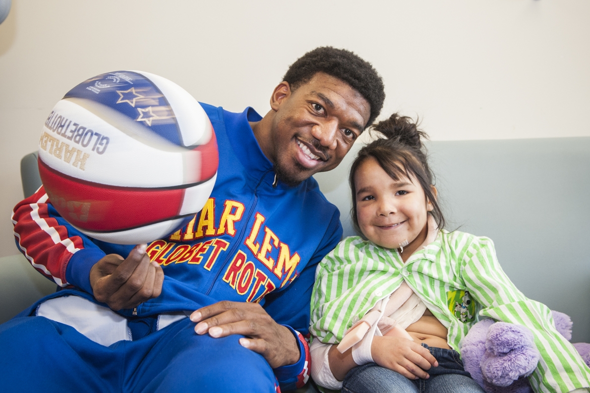 Harlem Globetrotter Anthony "Buckets" Blakes visited KGH's Pediatrics unit before a game at the K-Rock Centre
