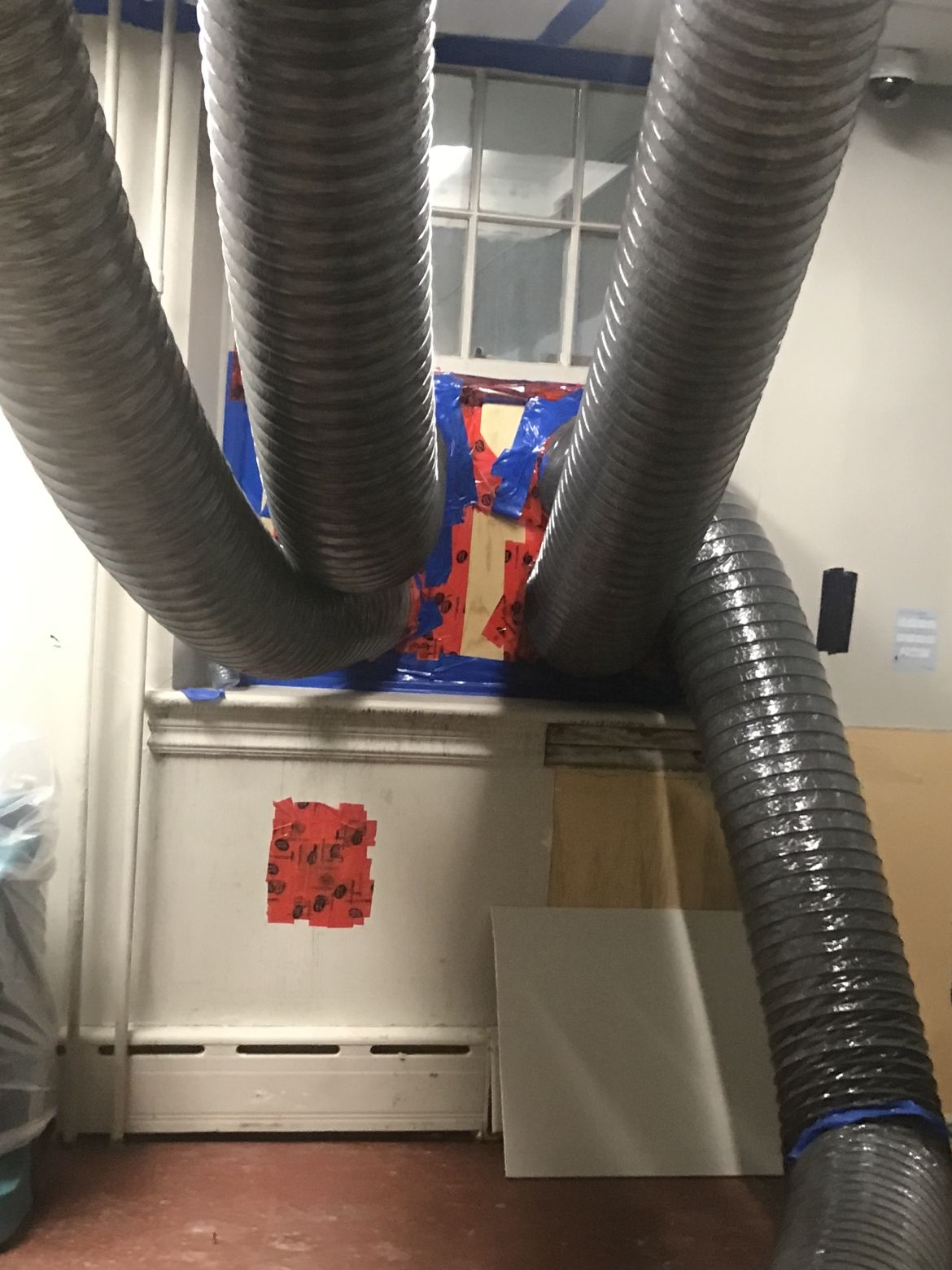 hoses ventilating air outside clinic