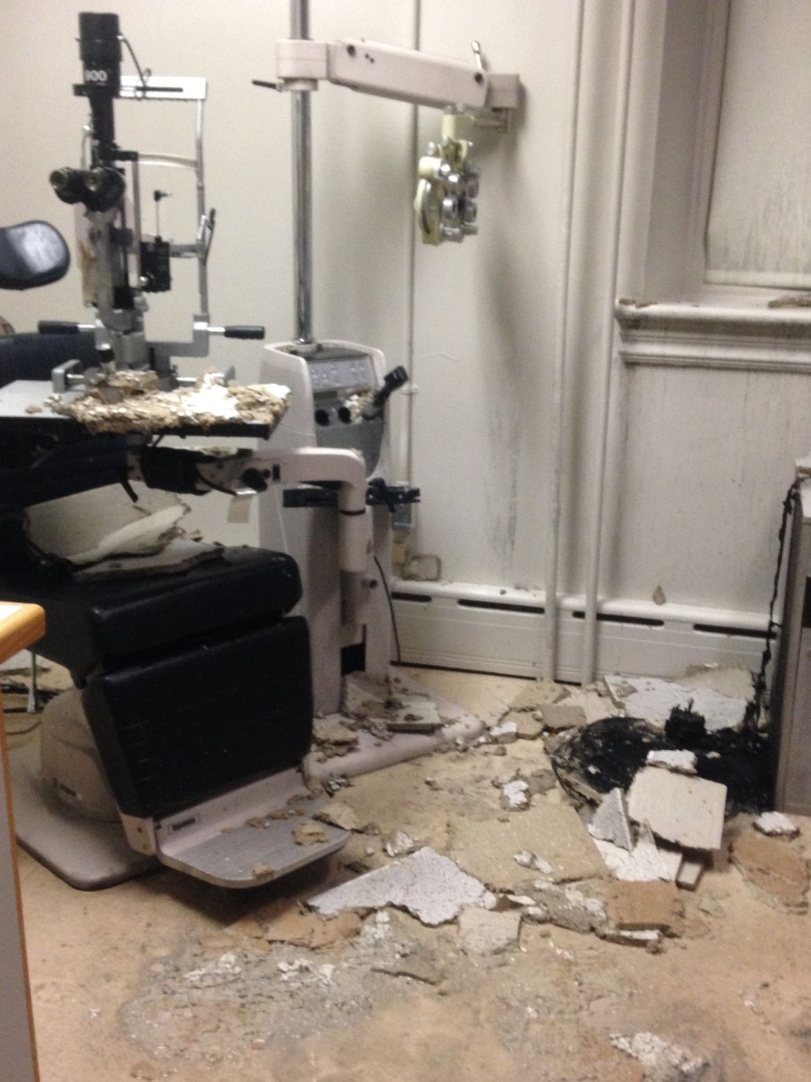 fire-damaged clinic exam room