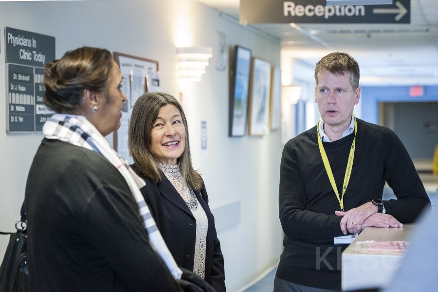 SELHIN Board Chair Hersh Sehdev, MPP Sophie Kiwala and Advanced Practice Physiotherapist John Hope tour the clinic