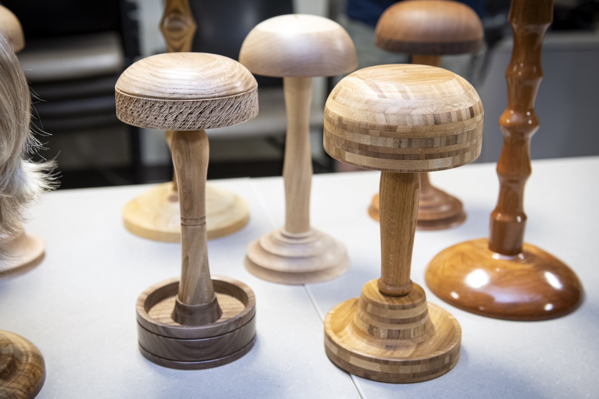 Members of the club volunteered their time to hand create the wig stands, spending around three hours per stand and crafting them over the past several weeks.