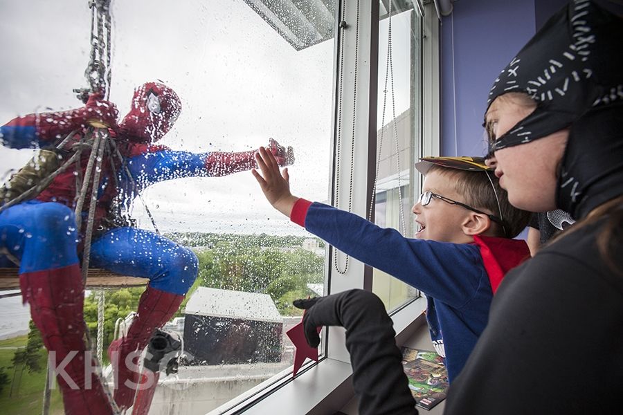 Superheroes from Elite Window Cleaning bring smiles to our youngest patients at our KGH site.