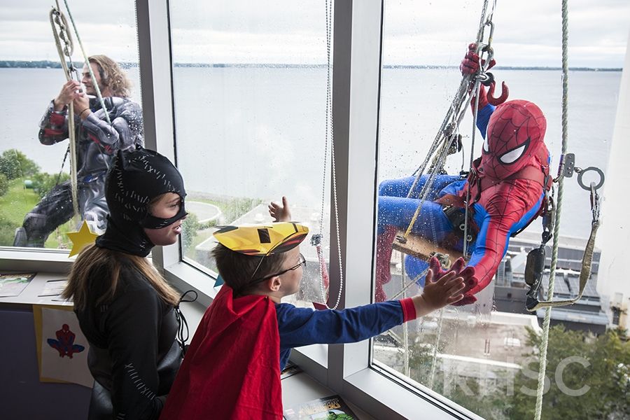 Superheroes from Elite Window Cleaning bring smiles to our youngest patients at our KGH site.
