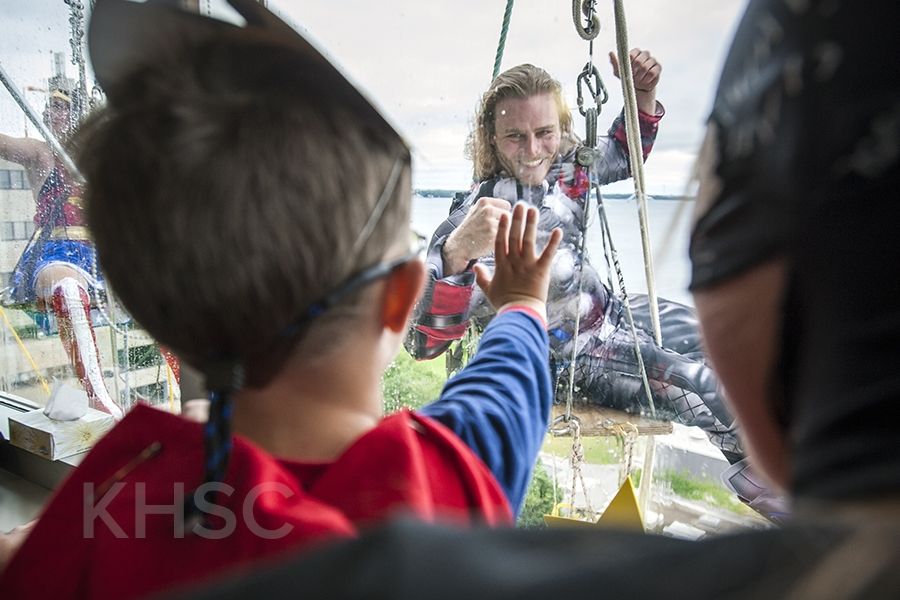 Superheroes from Elite Window Cleaning bring smiles to our youngest patients at our KGH site.