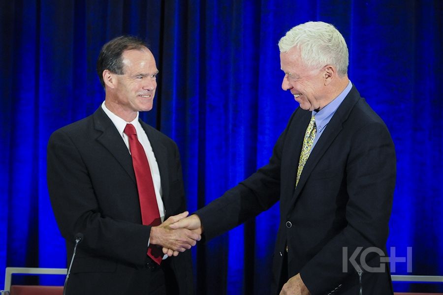 Hotel Dieu Board Chair Michael Hickey (L) and KGH Board Chair George Thomson (R) shake hands at the end on the announcement press conference.