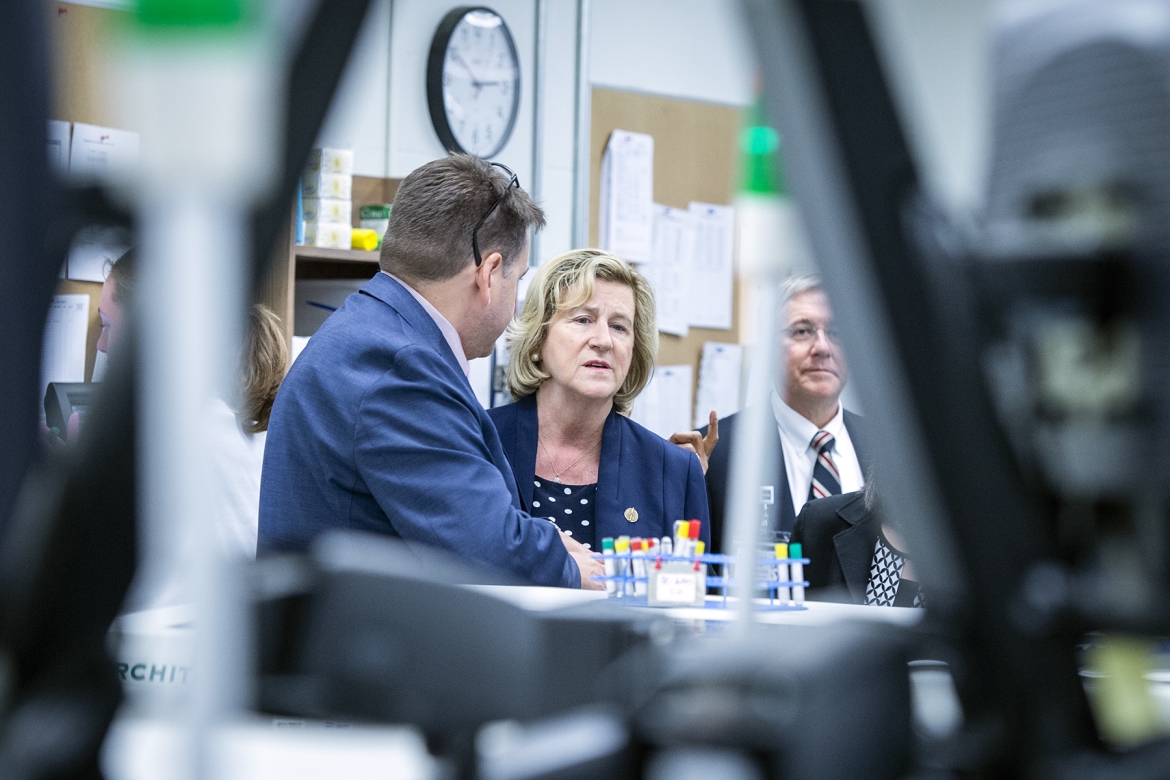 Chief Information Officer Troy Jones tours Minister Jaczek through our Clinical Laboratory
