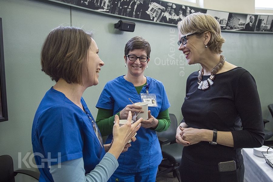 Leslee Thompson chats with staff during a brief farewell event at KGH.