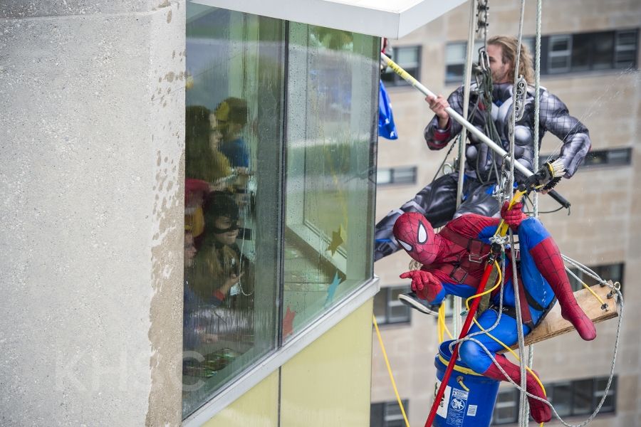 Superheroes from Elite Window Cleaning bring smiles to our youngest patients at our KGH site.