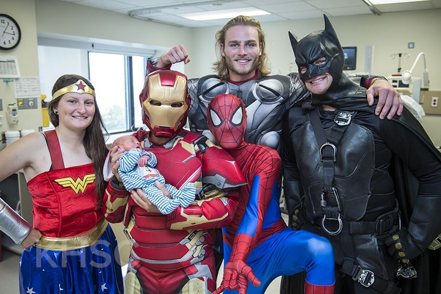 Superheroes from Elite Window Cleaning bring smiles to our youngest patients at our KGH site.