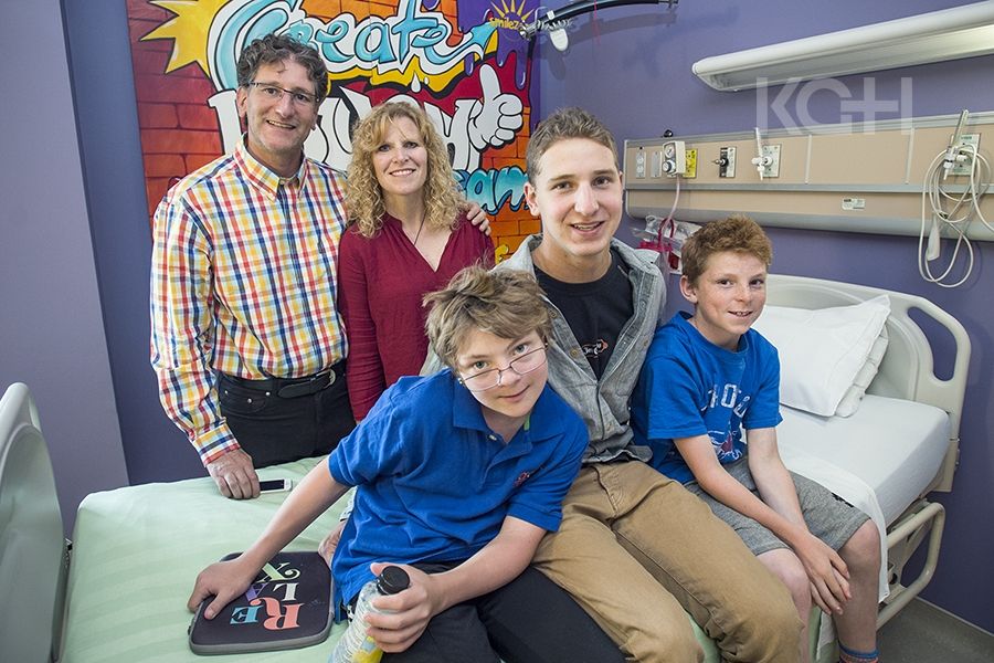 Donor family from Kingston in one of the renovated inpatient rooms at KGH.