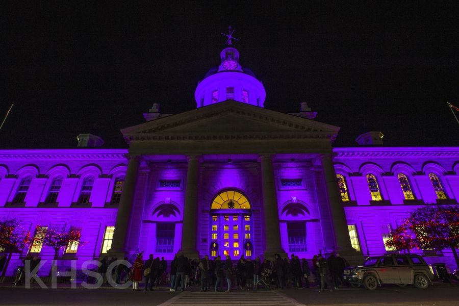 Kingston City Hall is illuminated by purple lights to recognize World Prematurity Day