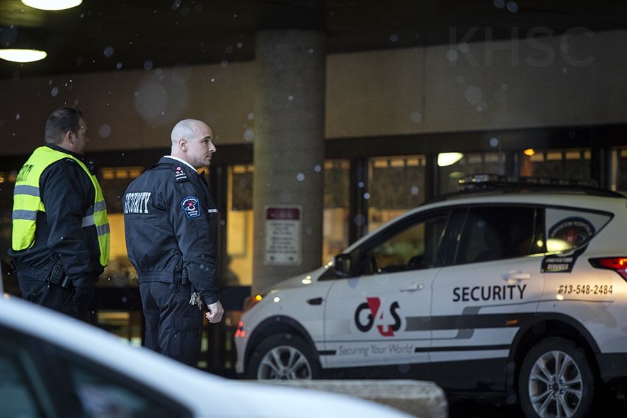 Rob Jones and Brent Reynolds direct traffic and help patients and families at the main entrance our HDH site