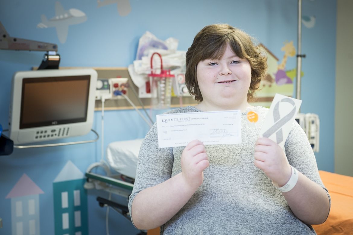 Former patient Carly sold candy in support of KHSC pediatric oncology patients