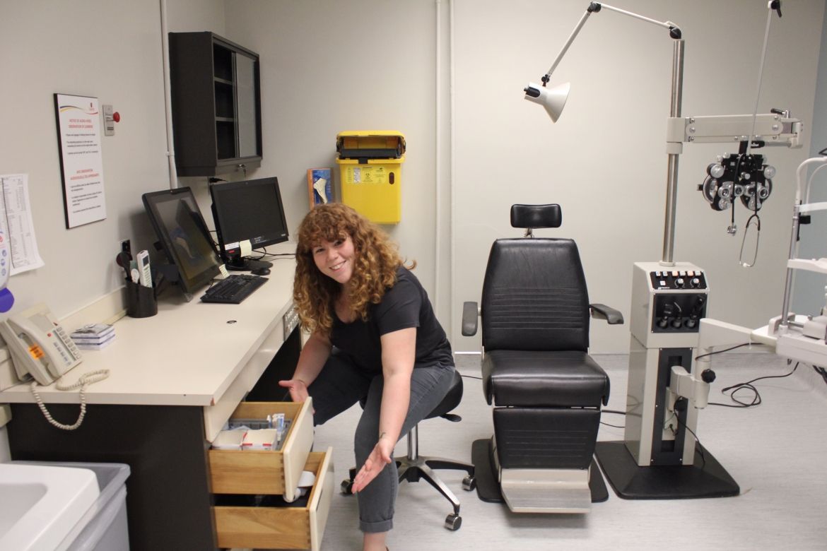 clinic staff restocking clinic space