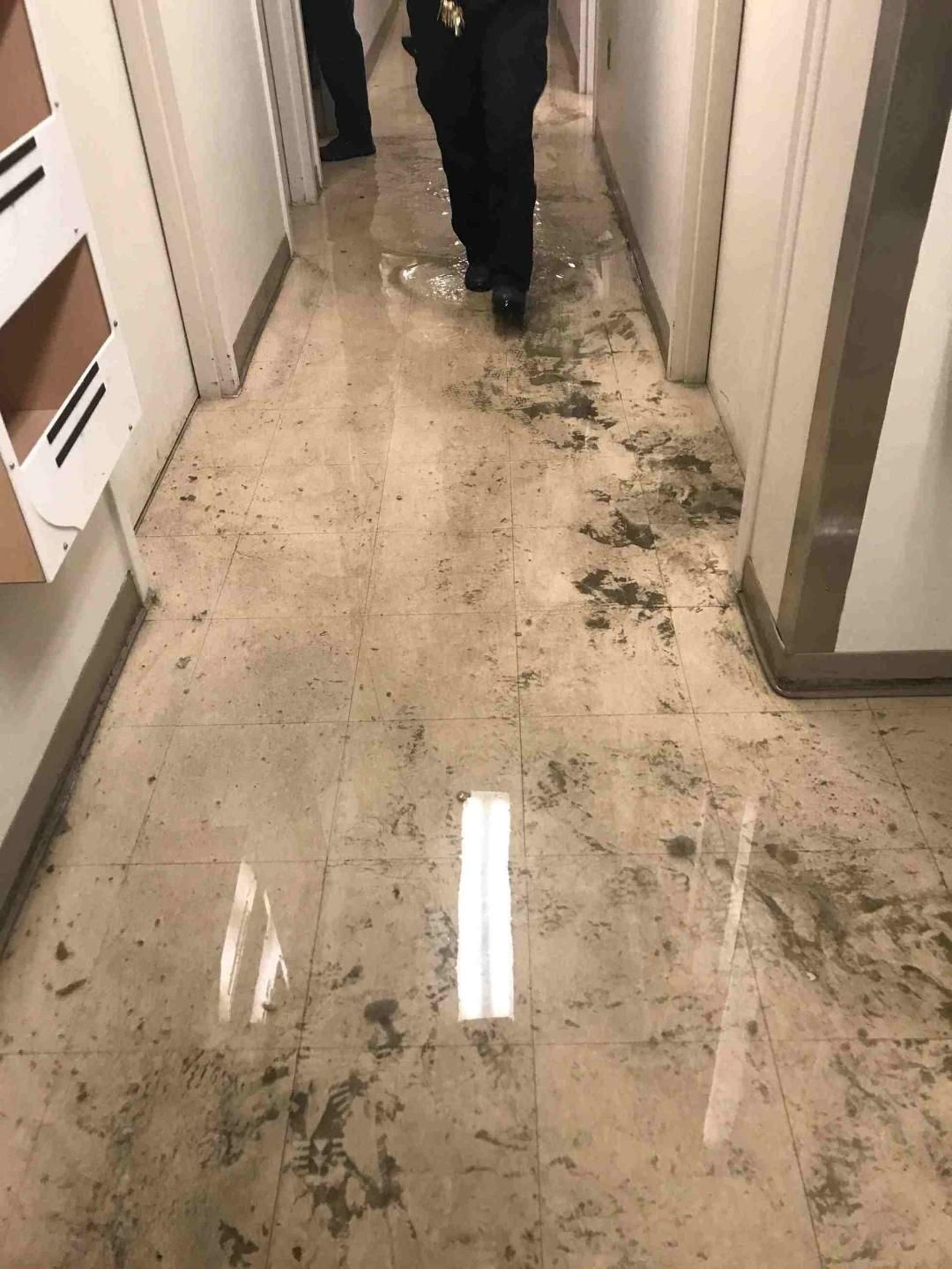 watersoaked hallway in clinic
