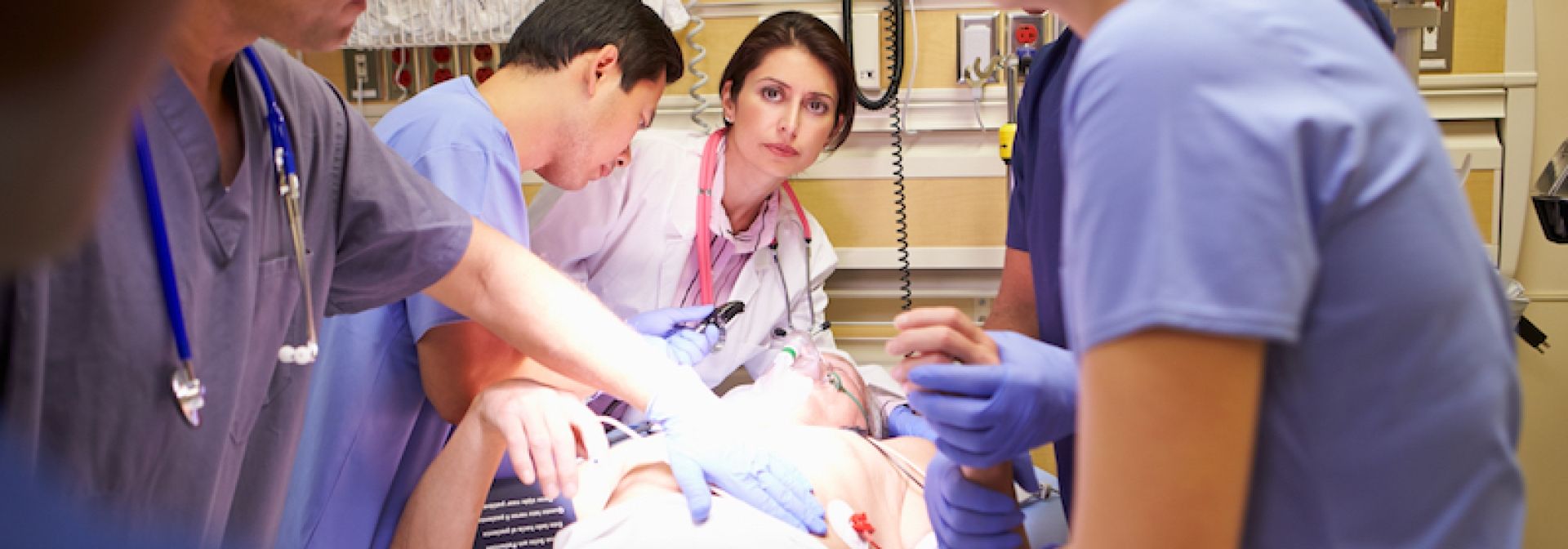 Medical team working on patient