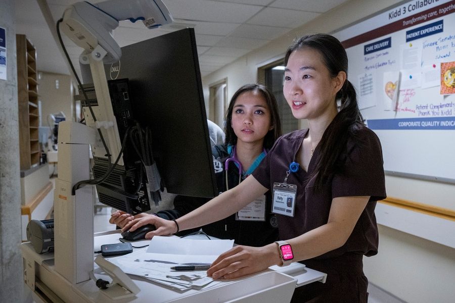 Staff using new Lumeo system