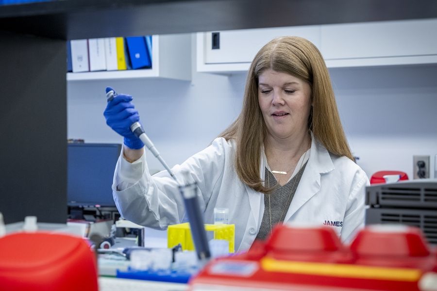 Dr. Paula James works in her research lab