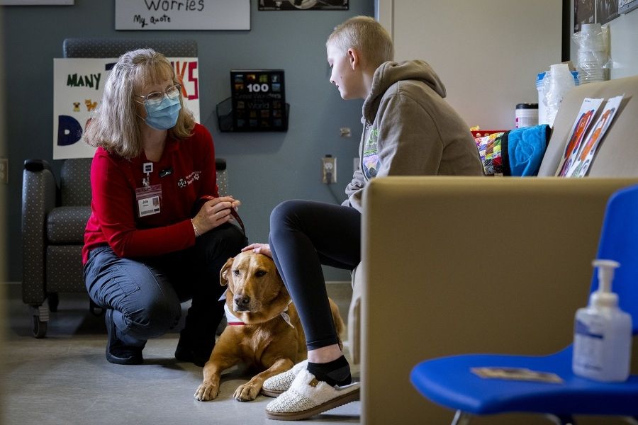 Julie Halle and Doc visit a patient.