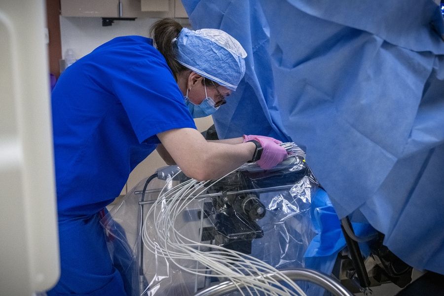 radiation therapist preparing for treatment
