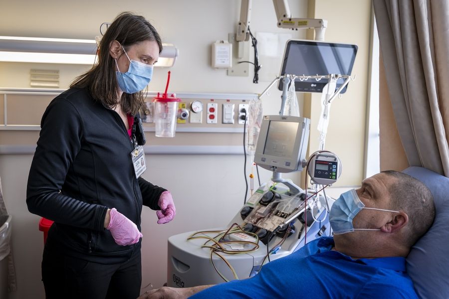 KHSC nurse provides care to a patient receiving cellular therapy.