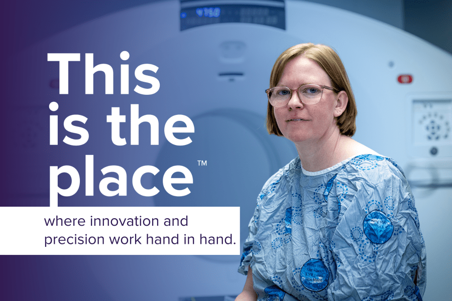 A portrait of a patient next to the PET-CT scanner