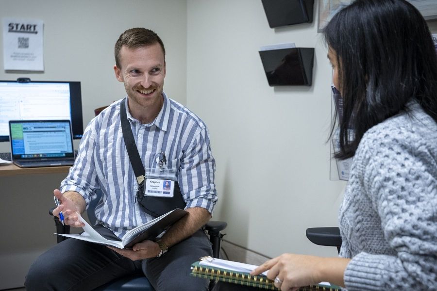 Khayman Wood with a patient