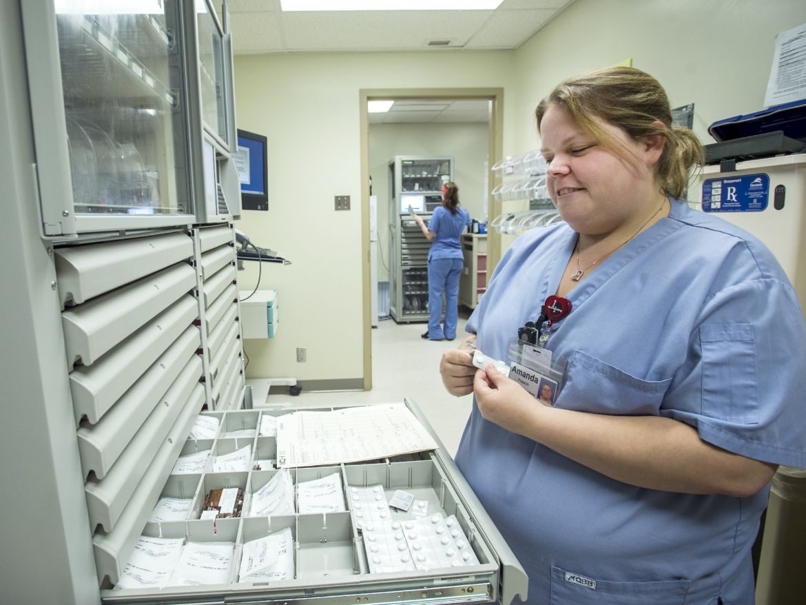 Automated drug cabinets