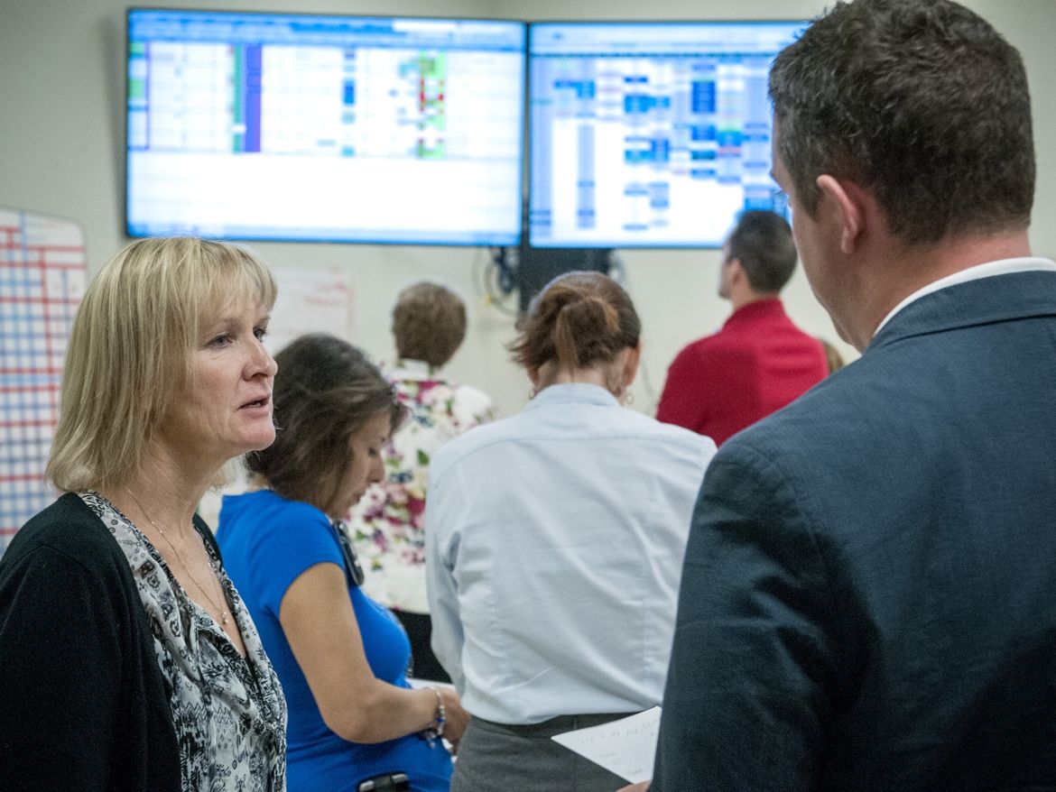 A staff meeting to discuss hospital bed allocation