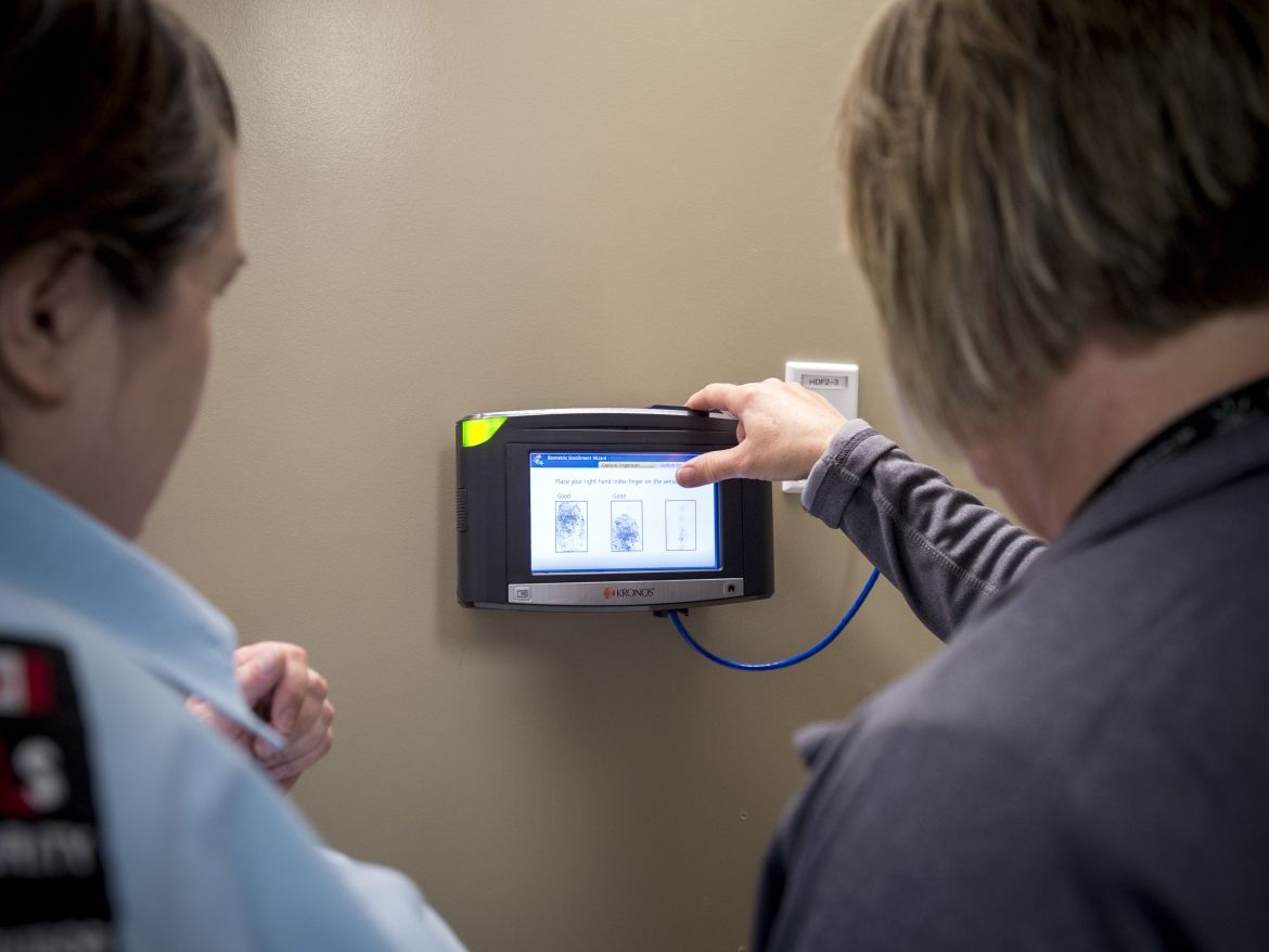 Staff using the SSTC kiosk