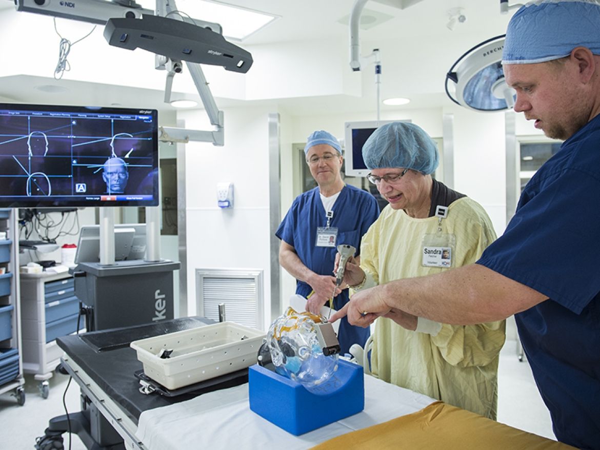 Dr Cook demonstrates how the new system works in the OR suite at KGH.