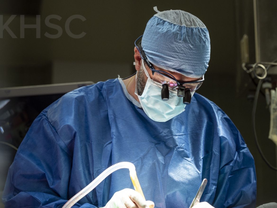 Dr. Gianluigi Bisleri performing cardiac surgery at Kingston Health Sciences Centre