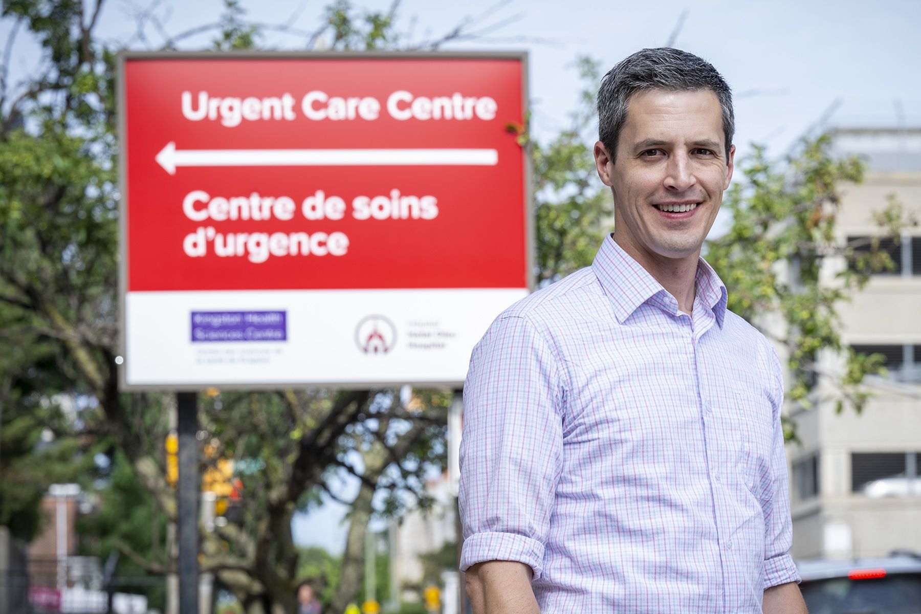 Dr. Dan Mulder stands outside the Urgent Care Centre at KHSC's Hotel Dieu Hospital site.