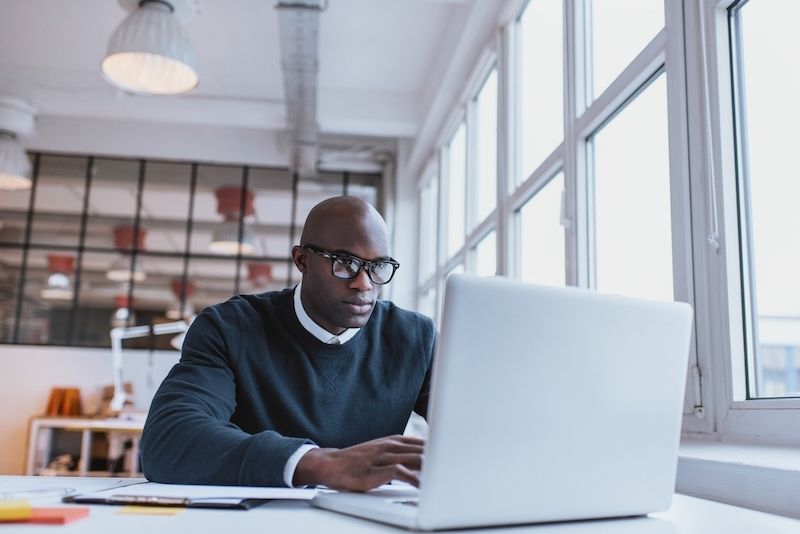 Man looking at a computer screen