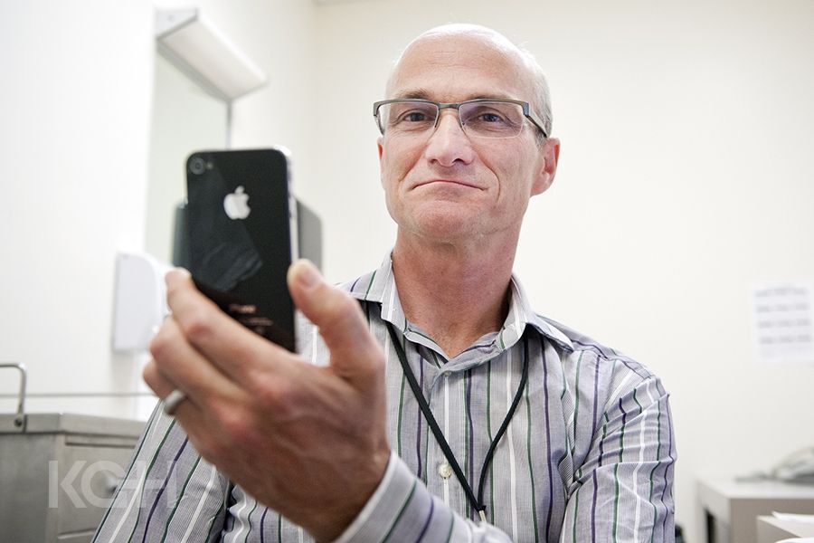 Dr. Graeme Smith in his clinic at KGH using one of his apps.