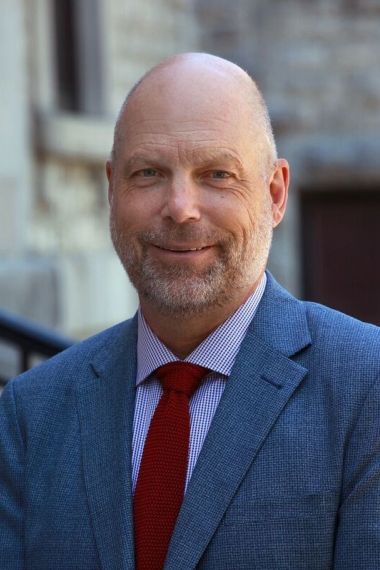 Dr. John Rudan